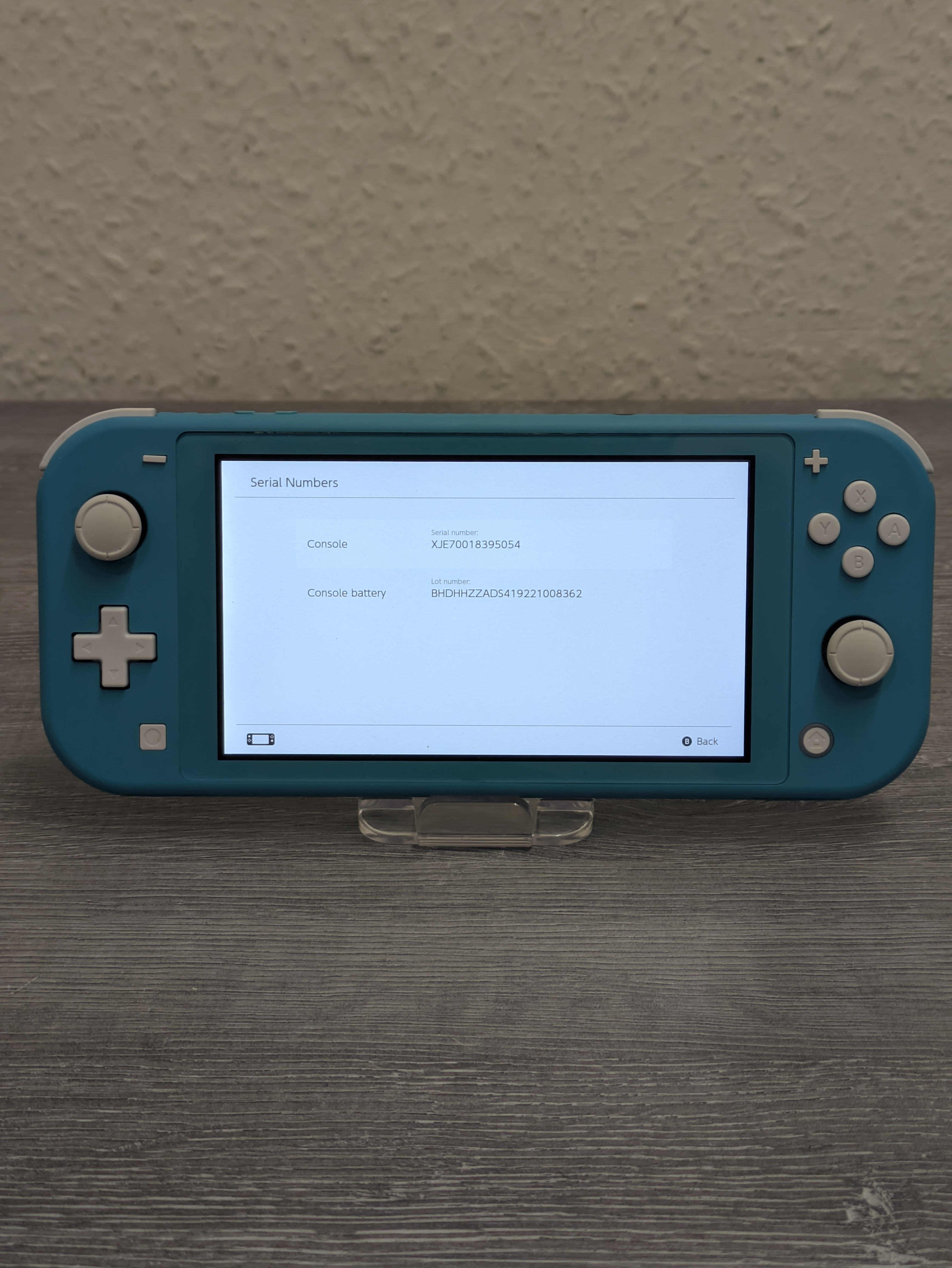 Pre-owned NINTENDO SWITCH LITE HDH-001 - WITH CHARGER (CYAN